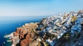 Oia village, Santorini, Greece. View of traditional houses in Santorini. Small narrow streets and rooftops of houses, churches and Royalty Free Stock Photo