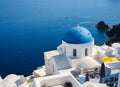 Oia village, Santorini Island, Greece. View of traditional houses and church in Santorini. Royalty Free Stock Photo