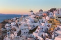 Oia village at sunset, Santorini island, Greece. Royalty Free Stock Photo