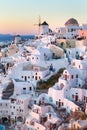 Oia village at sunset, Santorini island, Greece.