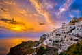 Oia village, windmills, Santorini island, Greece at colorful sunset Royalty Free Stock Photo