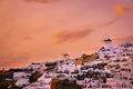 Oia village, windmills, Santorini island, Greece at colorful sunset Royalty Free Stock Photo