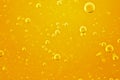 Oil background. Golden liquid with air bubbles on white background  for projects, oil, honey, beer, juice, shampoos Royalty Free Stock Photo
