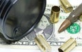 Oil barrel one dollar bill and bullets oil industry war for resources concept