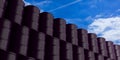 Oil barrels stack on blue sky background. 3d illustration Royalty Free Stock Photo