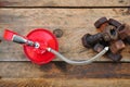 Oil can on wooden background, Lube oil can and used in industry or hard works Royalty Free Stock Photo