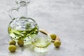 Oil in carafe with spices and olive on stone background mock-up Royalty Free Stock Photo