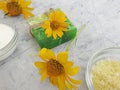 Oil cosmetic soap accessories  health    calendula flower on concrete background Royalty Free Stock Photo