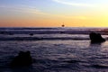 Oil Derrick and Rocks at Sunset in Goleta, California Royalty Free Stock Photo