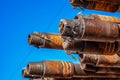 Oil Drill pipe. Rusty drill pipes were drilled in the well section. Downhole drilling rig. Royalty Free Stock Photo