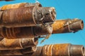 Oil Drill pipe. Rusty drill pipes were drilled in the well section. Royalty Free Stock Photo