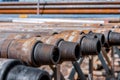 Oil Drill pipe. Rusty drill pipes were drilled in the well section. Downhole drilling rig. Royalty Free Stock Photo