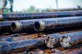 Oil Drill pipe. Rusty drill pipes were drilled in the well section. Downhole drilling rig. Royalty Free Stock Photo