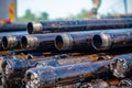 Oil Drill pipe. Rusty drill pipes were drilled in the well section. Downhole drilling rig. Royalty Free Stock Photo