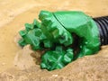 Oil drilling bit in mud Royalty Free Stock Photo