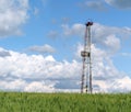 oil drilling rig and blue sky with clouds Royalty Free Stock Photo