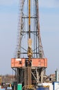 Oil drilling rig with workers