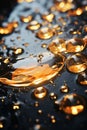 oil droplets on a black surface with gold bubbles