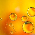 Oil drops in water, bubbles on orange background Royalty Free Stock Photo