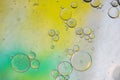 Green, yellow and white abstract background picture made with oil, water and soap Royalty Free Stock Photo