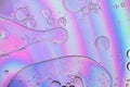 Holographic abstract background in pastel neon color picture made with oil, water and soap Royalty Free Stock Photo