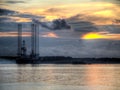 Oil Exploration Rig at Dawn Royalty Free Stock Photo