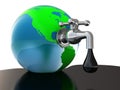 Oil faucet in earth globe Royalty Free Stock Photo