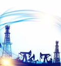 Oil field with derricks and pumpd over blue sky background. Royalty Free Stock Photo