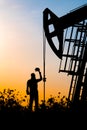 Oil field, the oil workers are working Royalty Free Stock Photo