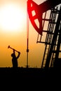 Oil field, the oil workers are working Royalty Free Stock Photo