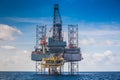 Oil and gas drilling rig just completion on oil and gas wellhead platform for new wellhead platform Royalty Free Stock Photo