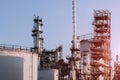 Oil refinery plant on blue sky on sunset background Royalty Free Stock Photo