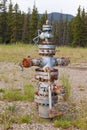 Oil gas industry wellhead flange gear locked shut Royalty Free Stock Photo