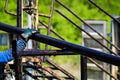 Oil and gas industry worker operates oil rig drill pipes on an oil well rig Royalty Free Stock Photo