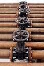 Oil and gas pipeline valves on a piping Royalty Free Stock Photo