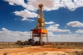 Oil or gas production station in a hot desert area under the scorching sun. Generative AI