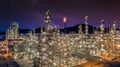 Oil and gas refinery plant form industry zone at night sky  with star, Aerial view oil and gas Industrial petrochemical fuel power Royalty Free Stock Photo