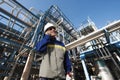 Oil and gas workers in front of refinery Royalty Free Stock Photo