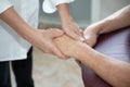 Oil hand massage hands man close-up  in spa salon by professional masseuse Royalty Free Stock Photo