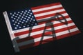 oil industry of USA . Oil rigs on the background of the United States of America flag. Mining and oil export. trading on Royalty Free Stock Photo