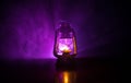 Oil Lamp Lighting up the Darkness or Burning kerosene lamp background, concept lighting. Selective focus