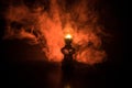 Oil Lamp Lighting up the Darkness or Burning kerosene lamp background, concept lighting. Selective focus