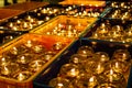 Oil lamps in a Buddhist temple in Singapore during Vesak Day / Buddha Day celebrations
