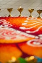 Oil lamps and kolam at Hindu Wedding