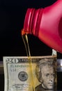 Oil for Money Royalty Free Stock Photo