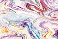 Oil paint mix abstract background. Rainbow marble texture. Acrylic liquid flow colorful wallpaper. Creative violet