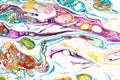 Oil paint mix abstract background. Rainbow marble texture. Acrylic liquid flow colorful wallpaper. Creative violet