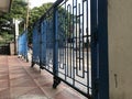 Oil painted Blue color Manual operated sliding door for front gate entrance of an residential complex