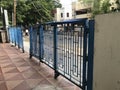 Oil painted Blue color Manual operated sliding door for front gate entrance of an residential complex