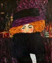 Oil painting on canvas. A beautiful red-haired girl. Free copy based on Klimt`s famous painting - A Lady in a Hat and Feather Boa Royalty Free Stock Photo